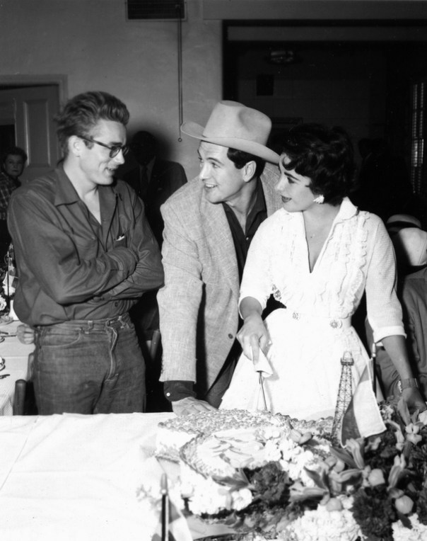 James Dean, Rock Hudson, and Elizabeth Taylor celebrate during the filiming of Giant.